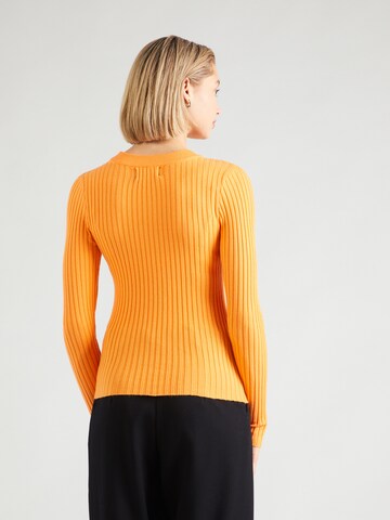 PIECES - Jersey 'CRISTA' en naranja