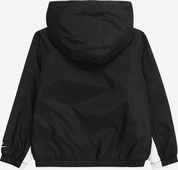 Veste mi-saison 'SWOOSH' Nike Sportswear en noir