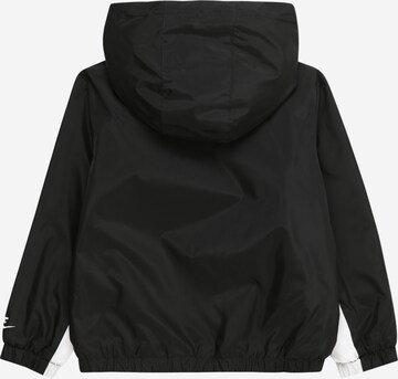 Nike Sportswear Between-season jacket 'SWOOSH' in Black