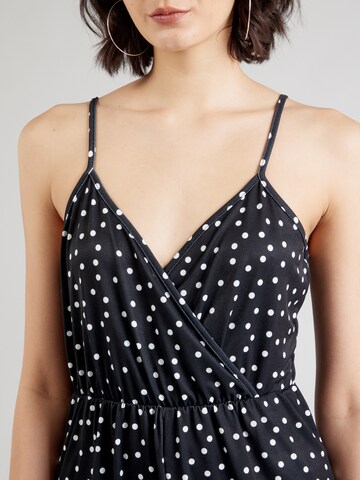Tuta jumpsuit 'Jessica' di ABOUT YOU in nero