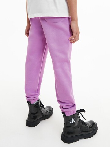 Tapered Pantaloni di Calvin Klein Jeans in lilla