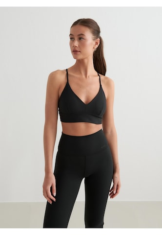 Bustino Reggiseno sportivo di Aim'n in nero