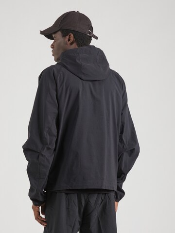 Nike Sportswear Between-season jacket 'Tech' in Black