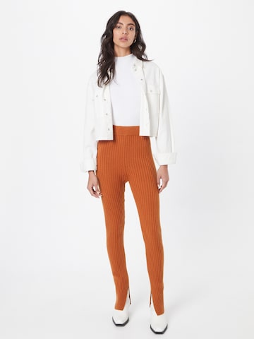 LEVI'S ® Tapered Leggingsit 'Rib Bottom Sweater Set' värissä oranssi