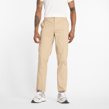 Regular Pantalon chino 'Athletics Standard Tapered' new balance en beige : devant