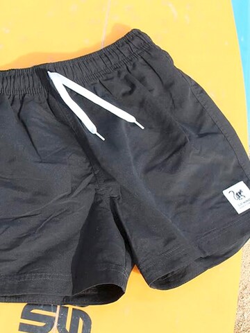 Surf Monkey Swimming Trunks in Black