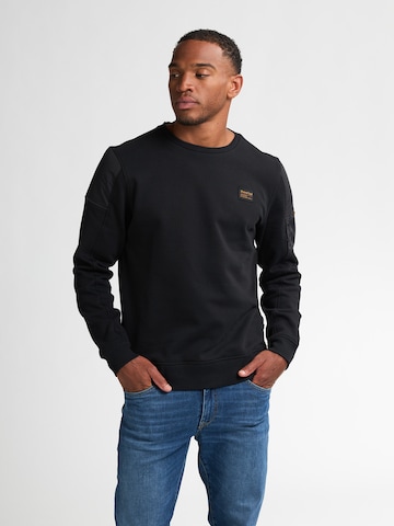 Sweat-shirt Petrol Industries en noir : devant