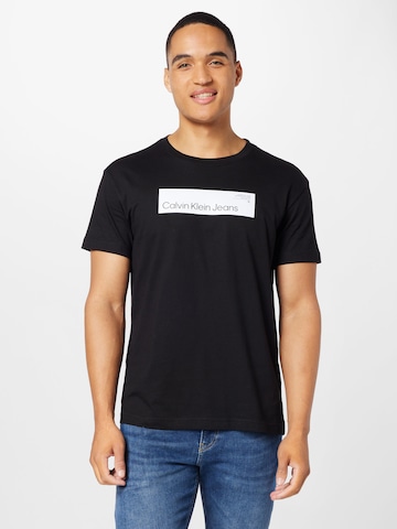 T-Shirt Calvin Klein Jeans en noir : devant