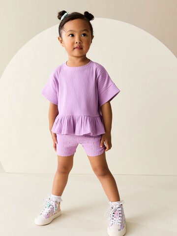 Set Next en violet : devant