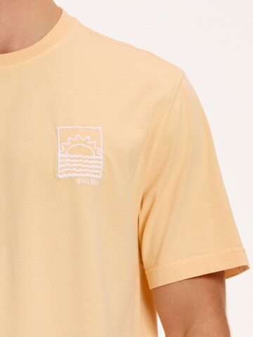 T-Shirt Shiwi en orange