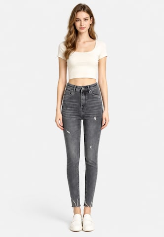 Skinny Jeans di Elara in grigio