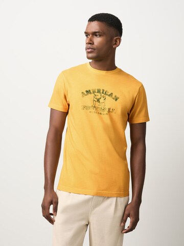 T-Shirt Next en jaune : devant