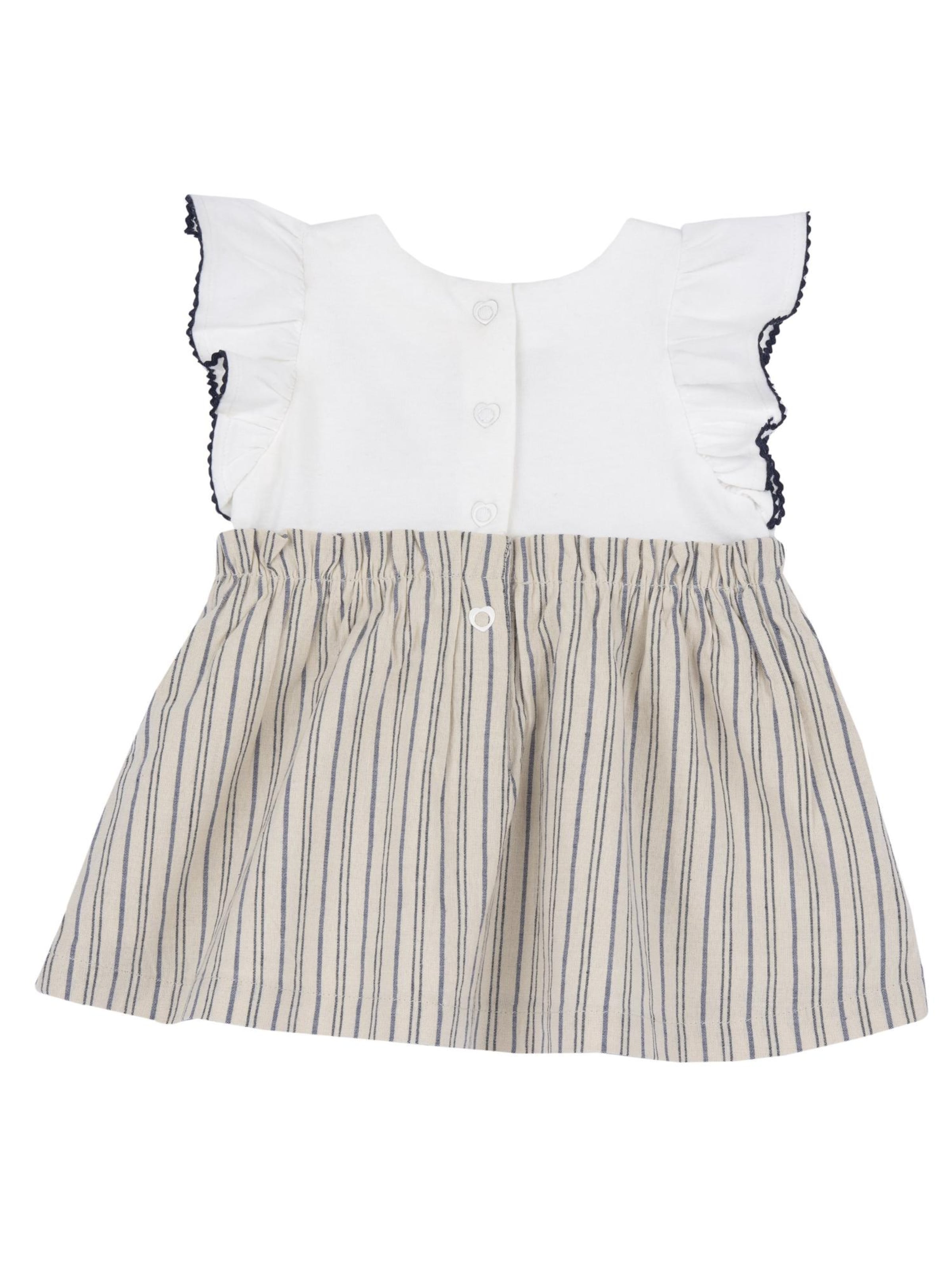 Rochie de la Chicco pe bej