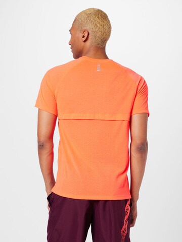 UNDER ARMOUR Functioneel shirt 'Streaker' in Oranje