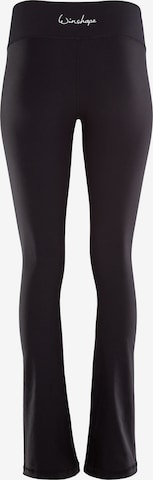 Winshape Rozkloszowany krój Spodnie sportowe 'BCL107' w kolorze czarny