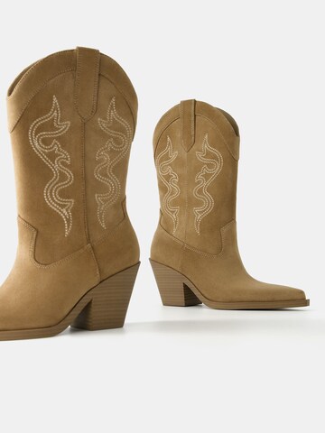 Bottes de cowboy Bershka en jaune