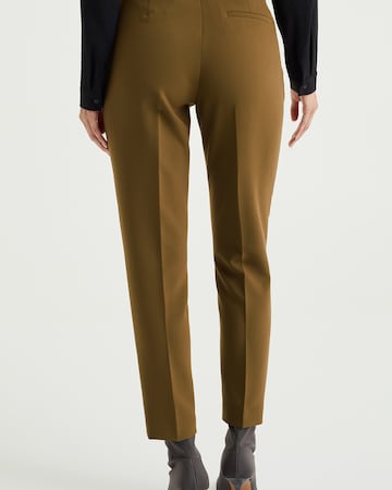 Tapered Pantaloni chino di WE Fashion in verde