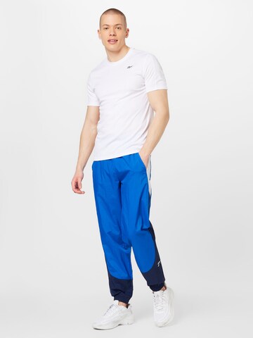 Reebok Zúžený Sportovní kalhoty – modrá