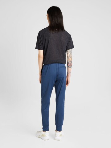 Effilé Pantalon de sport SKECHERS en bleu