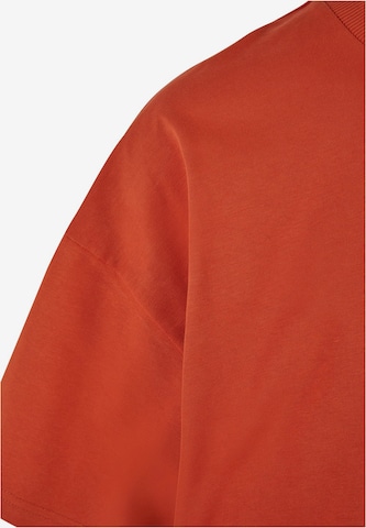 T-Shirt Karl Kani en orange