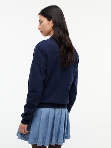 Tommy Jeans Collegepaita värissä sininen