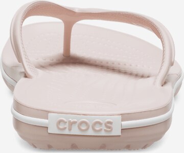 Crocs T-Bar Sandals in Beige: front