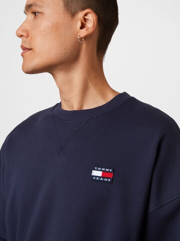 Tommy Jeans كنزة رياضية بلون أزرق