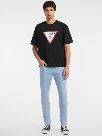 GUESS T-Shirt ' ICONIC' in Schwarz