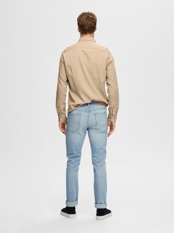 Coupe slim Jean 'LEON' SELECTED HOMME en bleu