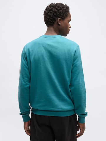 PUMASweater majica 'ESS ELEVATED' - zelena boja