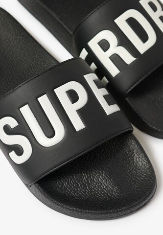Claquettes / Tongs Superdry & Co en noir