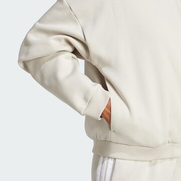 ADIDAS SPORTSWEAR - Sudadera con cremallera deportiva 'Essentials' en beige
