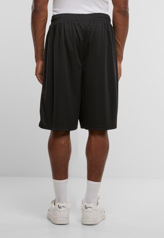 Regular Pantalon Karl Kani en noir