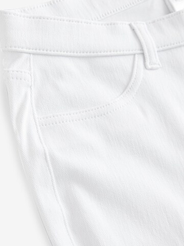 Skinny Leggings di Next in bianco