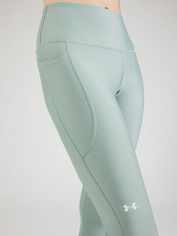 UNDER ARMOUR Skinny Sportovní kalhoty – zelená