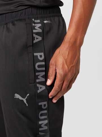 PUMA Tapered Sporthose in Schwarz