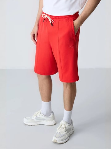 Tommy Life - Regular Calças de desporto em vermelho