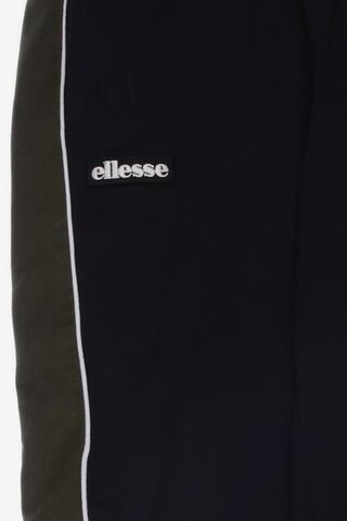 ELLESSE Pants in 31-32 in Black