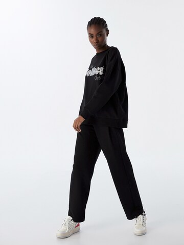 Sweat-shirt Twist en noir