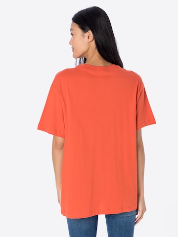 Nike Sportswear Majica | oranžna barva