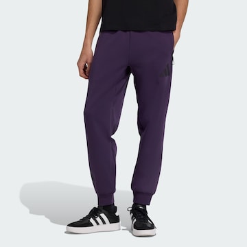 Effilé Pantalon de sport 'Z.N.E.' ADIDAS SPORTSWEAR en violet : devant