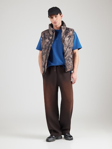 T-Shirt 'ESS' Nike Sportswear en bleu