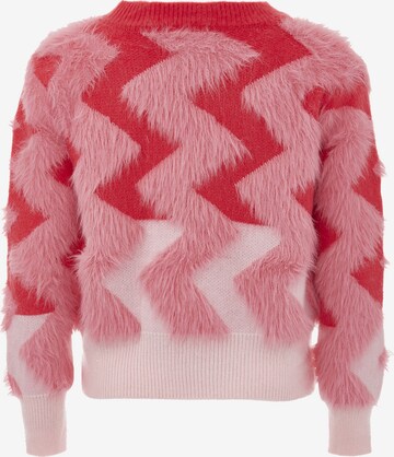 Pull-over swirly en rose