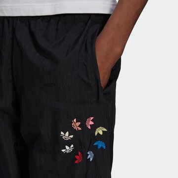 Tapered Pantaloni de la ADIDAS ORIGINALS pe negru