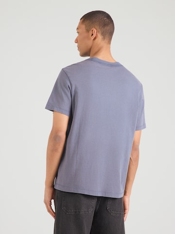 Calvin Klein Jeans T-shirt i blå