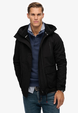 Veste mi-saison Superdry en noir : devant