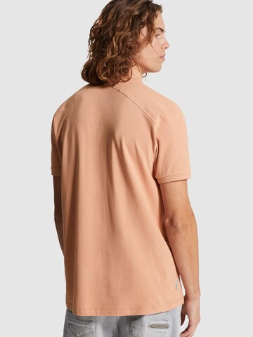 CAST IRON Paita 'Polo shirt in piqué with stretch' värissä oranssi