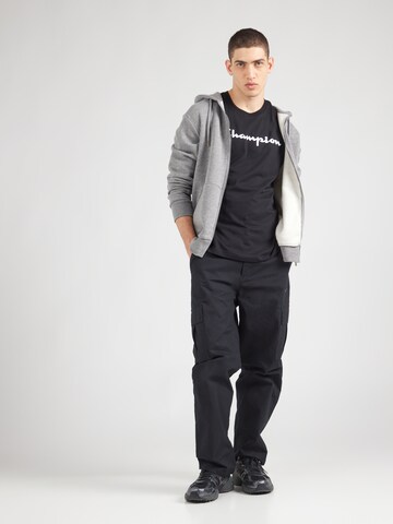 Maglietta di Champion Authentic Athletic Apparel in nero