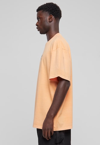 oranžs Karl Kani T-Krekls 'Small Signature'