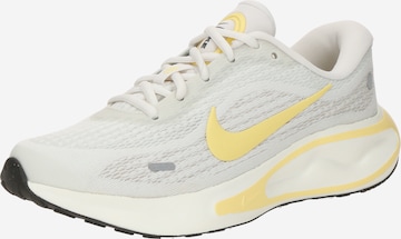Nike Sportswear - Sapatilhas baixas 'JOURNEY RUN' em bege: frente